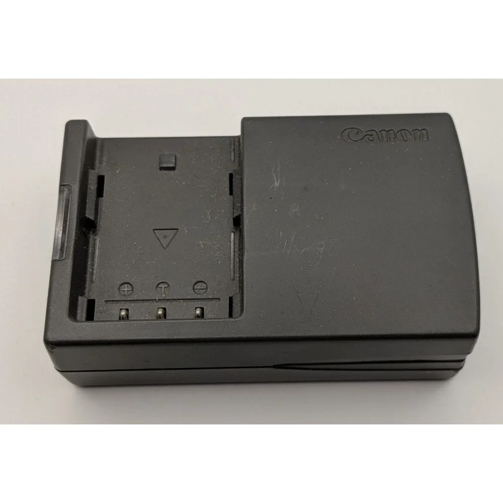 Canon Battery Charger CB-2LT Unisex OS Black Good Compact Wall Plug Untested